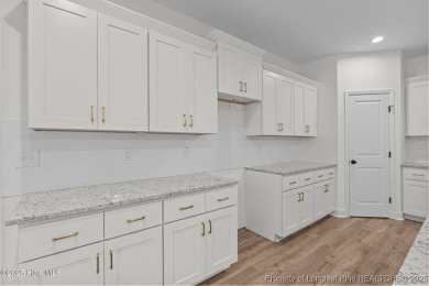 Now available and nearing completion, the 'Lindie' single level on Foxfire Golf and Country Club in North Carolina - for sale on GolfHomes.com, golf home, golf lot
