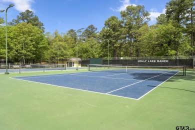 Experience the enchanting rhythm of nature year-round in this on Holly Lake Ranch Golf Club in Texas - for sale on GolfHomes.com, golf home, golf lot