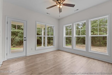 Now available and nearing completion, the 'Lindie' single level on Foxfire Golf and Country Club in North Carolina - for sale on GolfHomes.com, golf home, golf lot