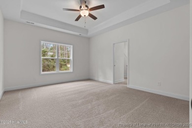 Now available and nearing completion, the 'Lindie' single level on Foxfire Golf and Country Club in North Carolina - for sale on GolfHomes.com, golf home, golf lot
