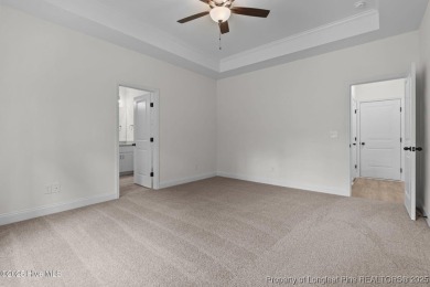 Now available and nearing completion, the 'Lindie' single level on Foxfire Golf and Country Club in North Carolina - for sale on GolfHomes.com, golf home, golf lot