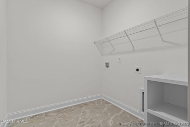 Now available and nearing completion, the 'Lindie' single level on Foxfire Golf and Country Club in North Carolina - for sale on GolfHomes.com, golf home, golf lot