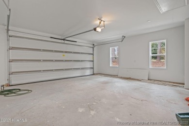 Now available and nearing completion, the 'Lindie' single level on Foxfire Golf and Country Club in North Carolina - for sale on GolfHomes.com, golf home, golf lot