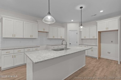Now available and nearing completion, the 'Lindie' single level on Foxfire Golf and Country Club in North Carolina - for sale on GolfHomes.com, golf home, golf lot