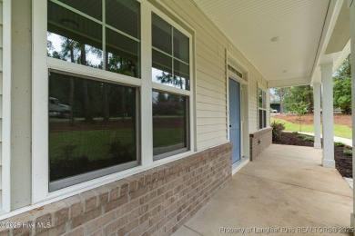 Now available and nearing completion, the 'Lindie' single level on Foxfire Golf and Country Club in North Carolina - for sale on GolfHomes.com, golf home, golf lot