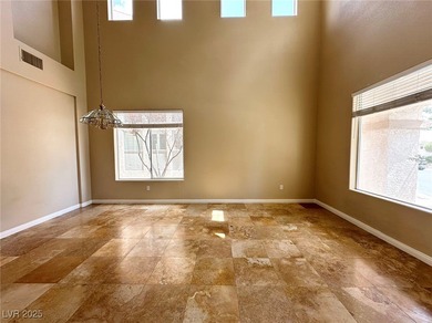 Golf course community, Guard gated. Vault ceiling, travertine on Rhodes Ranch Golf Club in Nevada - for sale on GolfHomes.com, golf home, golf lot