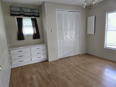ZELLWOOD STATION 2 Bedroom 2 bath home located in Citrus Ridge on Zellwood Station Country Club in Florida - for sale on GolfHomes.com, golf home, golf lot