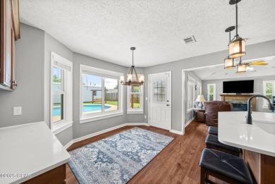 This spacious and beautifully updated 4-bedroom, 2.5-bath brick on Panama Country Club in Florida - for sale on GolfHomes.com, golf home, golf lot