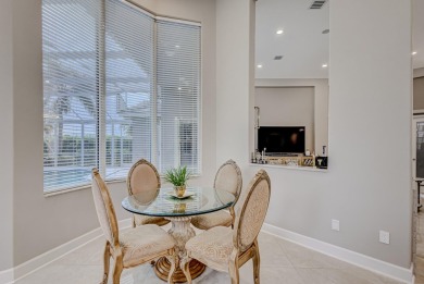 Discover unparalleled elegance in this stunning 3-bedroom on PGA National Estates Golf Course in Florida - for sale on GolfHomes.com, golf home, golf lot