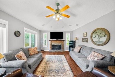 This spacious and beautifully updated 4-bedroom, 2.5-bath brick on Panama Country Club in Florida - for sale on GolfHomes.com, golf home, golf lot