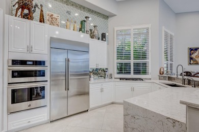 Discover unparalleled elegance in this stunning 3-bedroom on PGA National Estates Golf Course in Florida - for sale on GolfHomes.com, golf home, golf lot