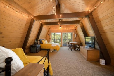 Nestled on a serene street in Moonridge, this charming Big Bear on Big Bear Mountain Ski and Golf Resort in California - for sale on GolfHomes.com, golf home, golf lot