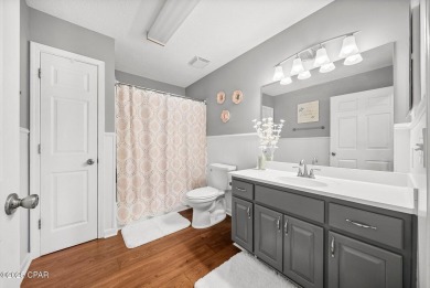 This spacious and beautifully updated 4-bedroom, 2.5-bath brick on Panama Country Club in Florida - for sale on GolfHomes.com, golf home, golf lot