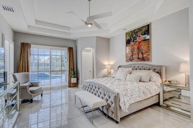 Discover unparalleled elegance in this stunning 3-bedroom on PGA National Estates Golf Course in Florida - for sale on GolfHomes.com, golf home, golf lot