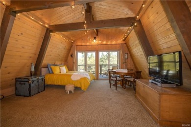 Nestled on a serene street in Moonridge, this charming Big Bear on Big Bear Mountain Ski and Golf Resort in California - for sale on GolfHomes.com, golf home, golf lot