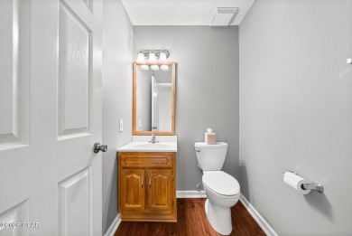 This spacious and beautifully updated 4-bedroom, 2.5-bath brick on Panama Country Club in Florida - for sale on GolfHomes.com, golf home, golf lot