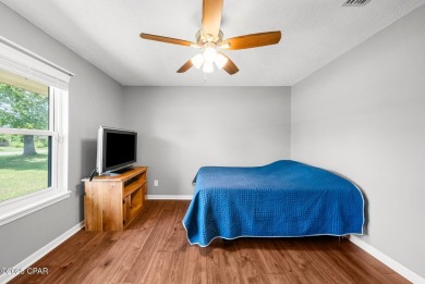 This spacious and beautifully updated 4-bedroom, 2.5-bath brick on Panama Country Club in Florida - for sale on GolfHomes.com, golf home, golf lot
