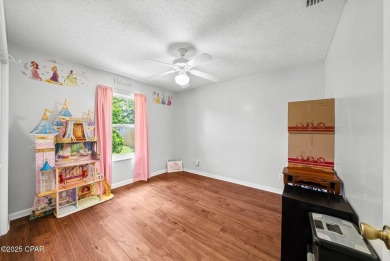 This spacious and beautifully updated 4-bedroom, 2.5-bath brick on Panama Country Club in Florida - for sale on GolfHomes.com, golf home, golf lot