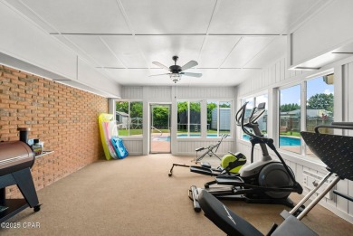 This spacious and beautifully updated 4-bedroom, 2.5-bath brick on Panama Country Club in Florida - for sale on GolfHomes.com, golf home, golf lot