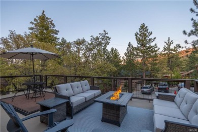 Nestled on a serene street in Moonridge, this charming Big Bear on Big Bear Mountain Ski and Golf Resort in California - for sale on GolfHomes.com, golf home, golf lot