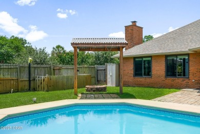 This spacious and beautifully updated 4-bedroom, 2.5-bath brick on Panama Country Club in Florida - for sale on GolfHomes.com, golf home, golf lot