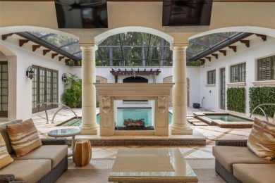 Luxury villa living within the exclusive Gardens of Isleworth on Isleworth Golf and Country Club in Florida - for sale on GolfHomes.com, golf home, golf lot