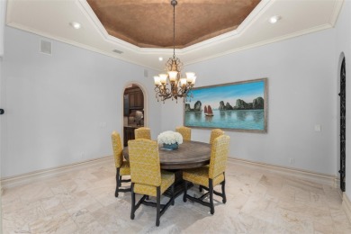 Luxury villa living within the exclusive Gardens of Isleworth on Isleworth Golf and Country Club in Florida - for sale on GolfHomes.com, golf home, golf lot