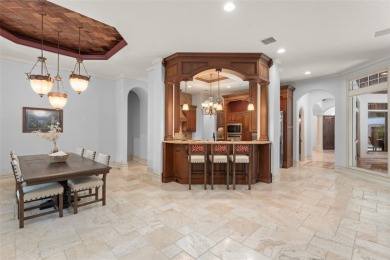 Luxury villa living within the exclusive Gardens of Isleworth on Isleworth Golf and Country Club in Florida - for sale on GolfHomes.com, golf home, golf lot
