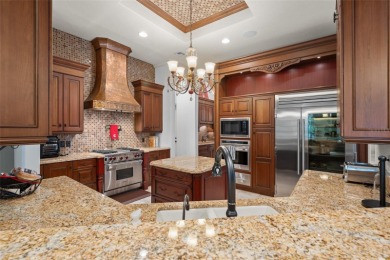 Luxury villa living within the exclusive Gardens of Isleworth on Isleworth Golf and Country Club in Florida - for sale on GolfHomes.com, golf home, golf lot