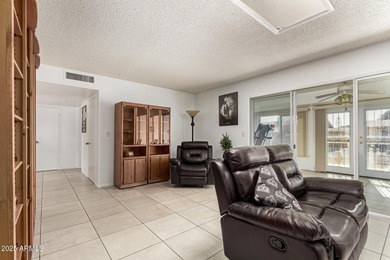 Welcome to this fully furnished charming 2-bedroom Gemini home on Sun City Country Club in Arizona - for sale on GolfHomes.com, golf home, golf lot