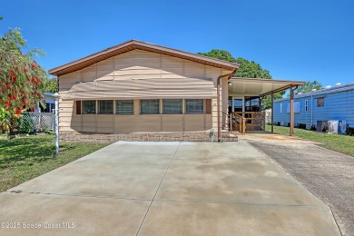 WELCOME TO THIS 2 BEDROOM 2 BATHROOM HOME IN LOVELY BAREFOOT on Barefoot Bay Golf Course in Florida - for sale on GolfHomes.com, golf home, golf lot