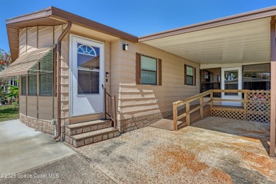 WELCOME TO THIS 2 BEDROOM 2 BATHROOM HOME IN LOVELY BAREFOOT on Barefoot Bay Golf Course in Florida - for sale on GolfHomes.com, golf home, golf lot