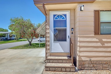 WELCOME TO THIS 2 BEDROOM 2 BATHROOM HOME IN LOVELY BAREFOOT on Barefoot Bay Golf Course in Florida - for sale on GolfHomes.com, golf home, golf lot