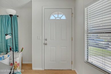 WELCOME TO THIS 2 BEDROOM 2 BATHROOM HOME IN LOVELY BAREFOOT on Barefoot Bay Golf Course in Florida - for sale on GolfHomes.com, golf home, golf lot