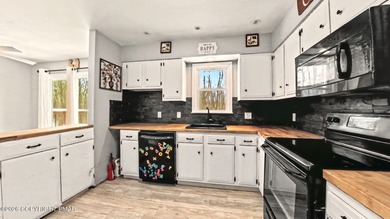 Located in a premier STR-friendly community, this home offers on Pocono Farms Country Club in Pennsylvania - for sale on GolfHomes.com, golf home, golf lot