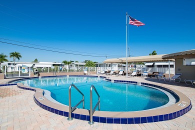 This 1200 square feet, 1.0 bed 1.5 bath Manufactured Home in the on Orangebrook Golf and Country Club in Florida - for sale on GolfHomes.com, golf home, golf lot