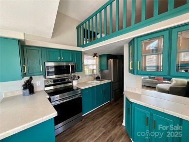 Welcome to your dream getaway at Badin Shores Resort! This on Old North State Club at Uwharrie Point Golf community in North Carolina - for sale on GolfHomes.com, golf home, golf lot