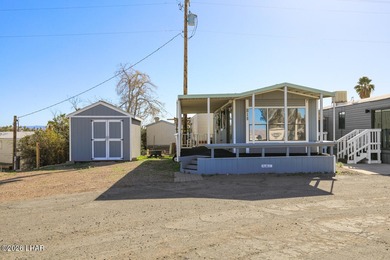 Located on Lease land. This desirable Park model unit offers on London Bridge Golf Course in Arizona - for sale on GolfHomes.com, golf home, golf lot