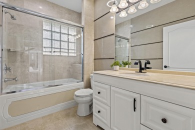 Magnificent 5BR/3BA pool home in Stonebridge CC in Boca Raton on Stonebridge Golf and Country Club in Florida - for sale on GolfHomes.com, golf home, golf lot