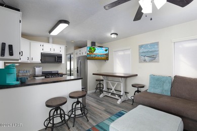 Located on Lease land. This desirable Park model unit offers on London Bridge Golf Course in Arizona - for sale on GolfHomes.com, golf home, golf lot