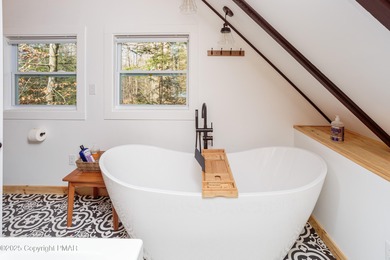 Your dream second home or STR investment awaits! Completely on Pocono Farms Country Club in Pennsylvania - for sale on GolfHomes.com, golf home, golf lot