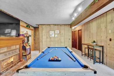 Welcome to your ideal Pocono escape in the heart of Lake Naomi on Lake Naomi Timber Trails Golf Club in Pennsylvania - for sale on GolfHomes.com, golf home, golf lot