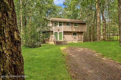 Welcome to your ideal Pocono escape in the heart of Lake Naomi on Lake Naomi Timber Trails Golf Club in Pennsylvania - for sale on GolfHomes.com, golf home, golf lot