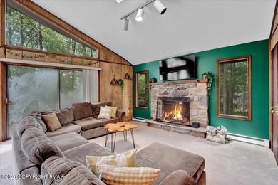 Welcome to your ideal Pocono escape in the heart of Lake Naomi on Lake Naomi Timber Trails Golf Club in Pennsylvania - for sale on GolfHomes.com, golf home, golf lot