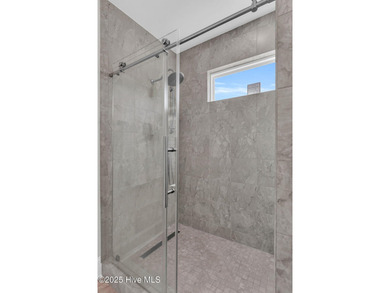 NEW PRICE on this exceptional end-unit townhome that defines on Sea Trail Golf Resort in North Carolina - for sale on GolfHomes.com, golf home, golf lot