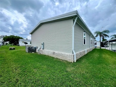 Presenting the largest and newest home currently on the market on Fairway Village Golf Course in Florida - for sale on GolfHomes.com, golf home, golf lot