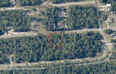 Half-acre lot in Citrus Springs offering a picturesque homesite on Pine Ridge Community Golf and Country Club in Florida - for sale on GolfHomes.com, golf home, golf lot