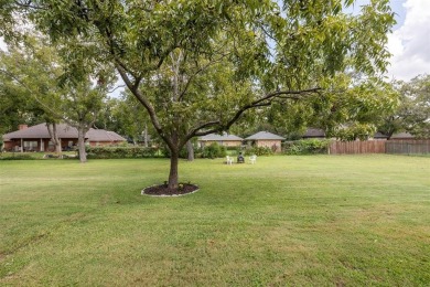 One owner custom built home with tons of recent updates located on Pecan Plantation Country Club in Texas - for sale on GolfHomes.com, golf home, golf lot