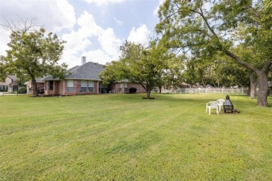 One owner custom built home with tons of recent updates located on Pecan Plantation Country Club in Texas - for sale on GolfHomes.com, golf home, golf lot