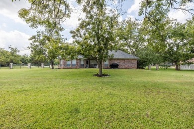 One owner custom built home with tons of recent updates located on Pecan Plantation Country Club in Texas - for sale on GolfHomes.com, golf home, golf lot